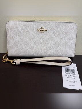 Coach long zip around wallet in signature canvas
